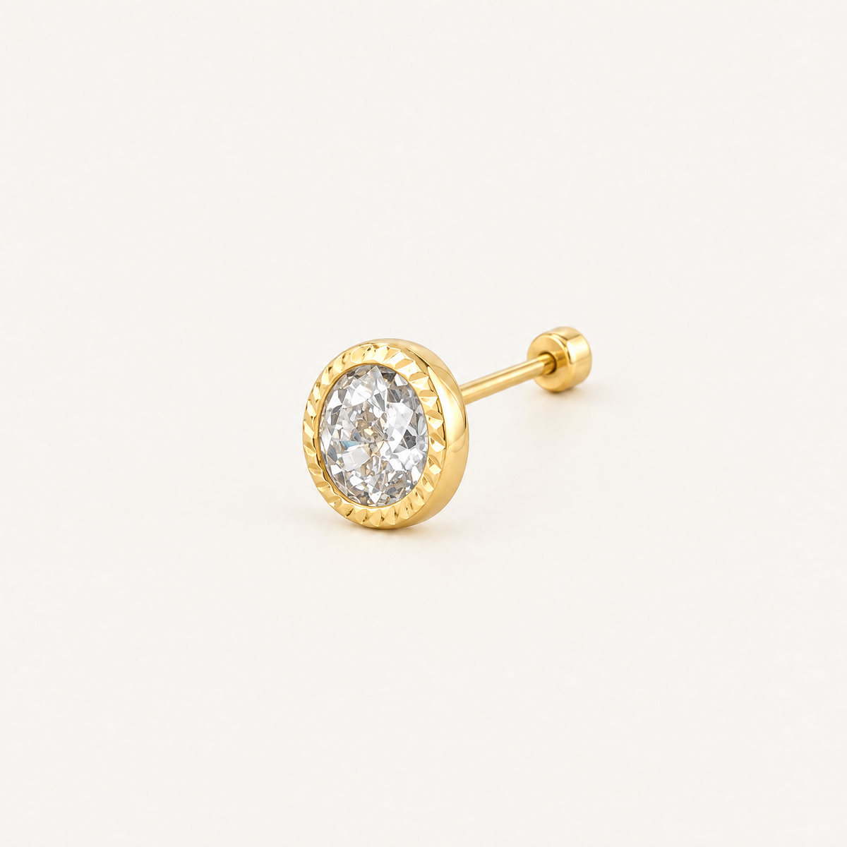 Broquel Zirconia Bisel Diamantado 5mm Oro 10K. Vista principal.