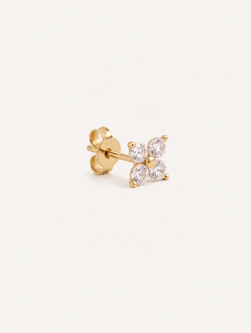 Broquel Flor Cuatro Zirconias Oro 10K — vista diagonal
