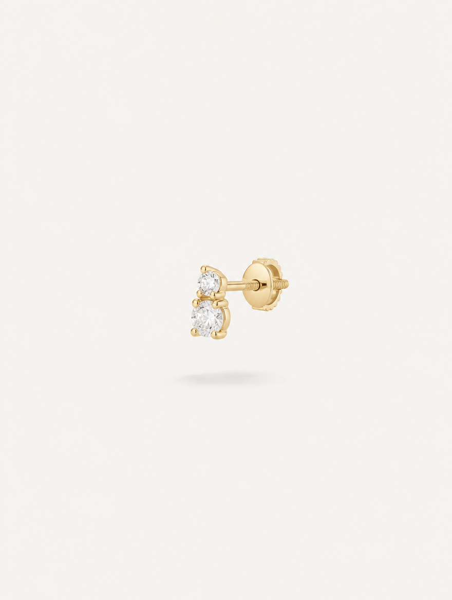 Broquel Dos Zirconias Oro 10K — vista diagonal