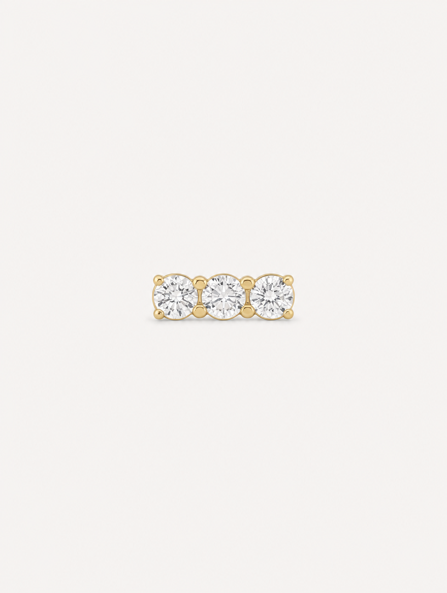 Broquel Tres Zirconias Grande Oro 10K — vista frontal