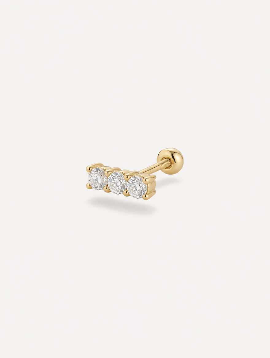 Broquel Tres Zirconias Oro 10K — vista diagonal