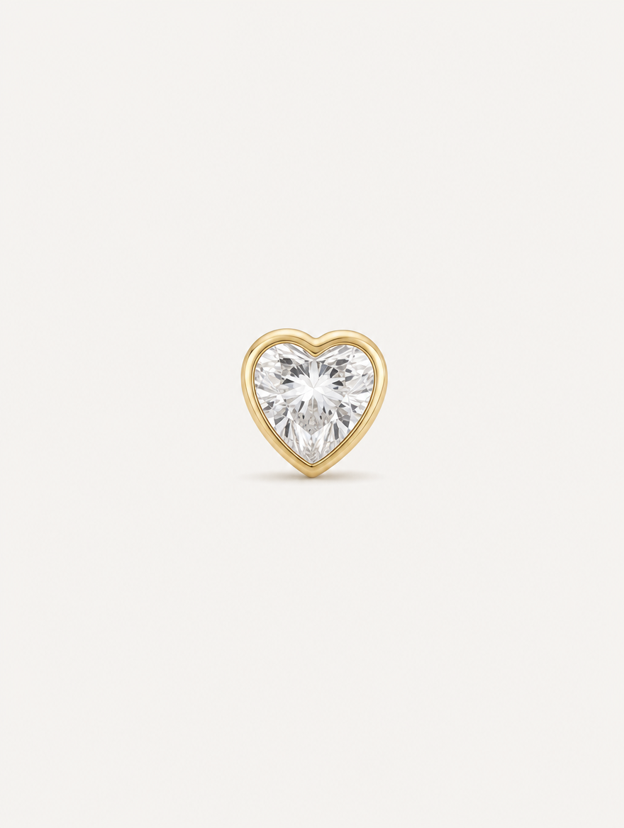 Broquel Corazón Zirconia Bisel Oro 10K — vista frontal