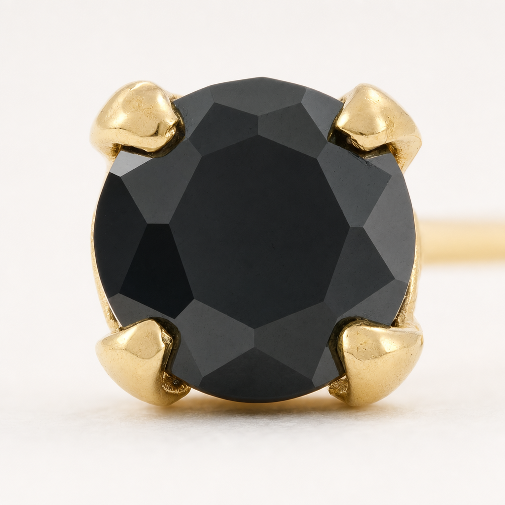 Broquel Solitario Zirconia Negra 3 mm Oro 10K — macro frontal