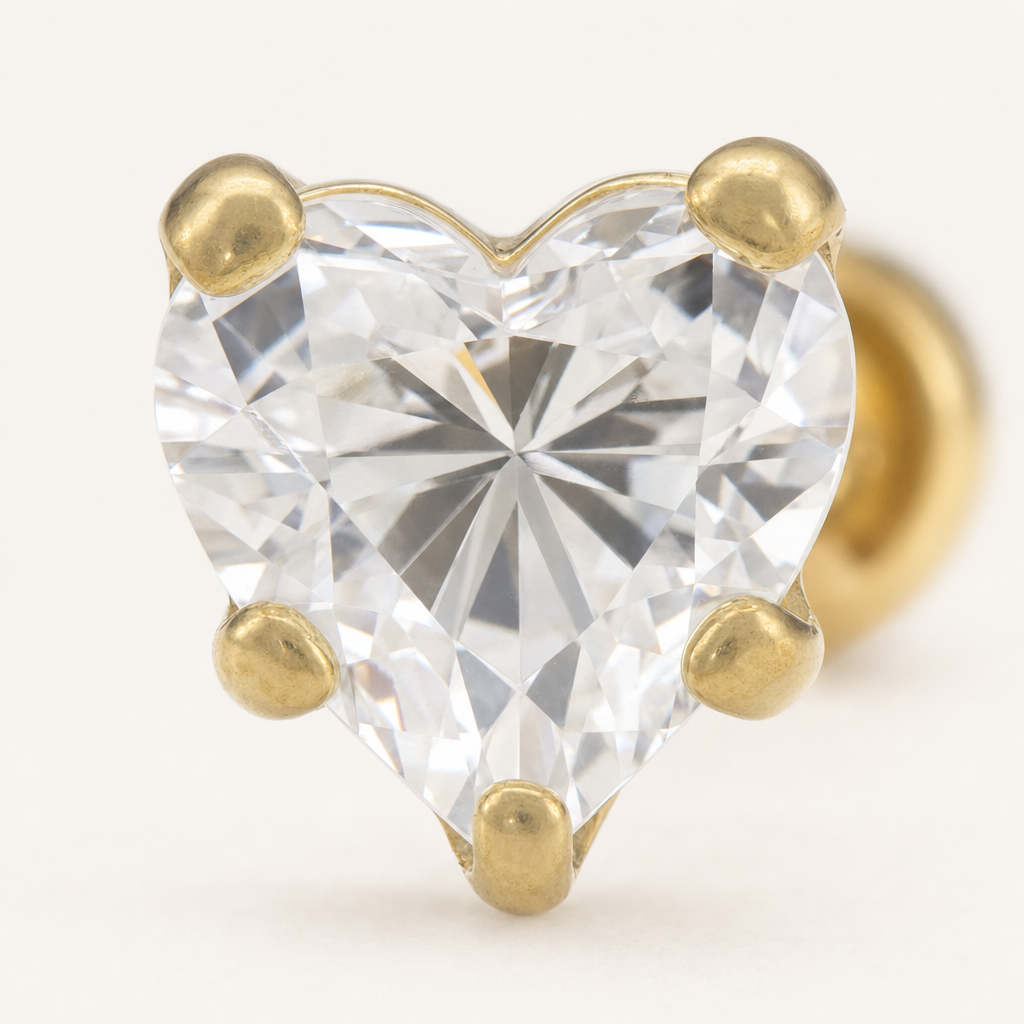Broquel Corazón Zirconia 4 mm Oro 10K — macro frontal