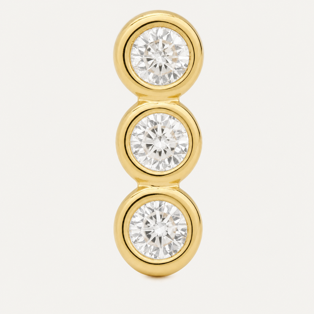Broquel Tres Biseles Zirconia Oro 10K — macro frontal