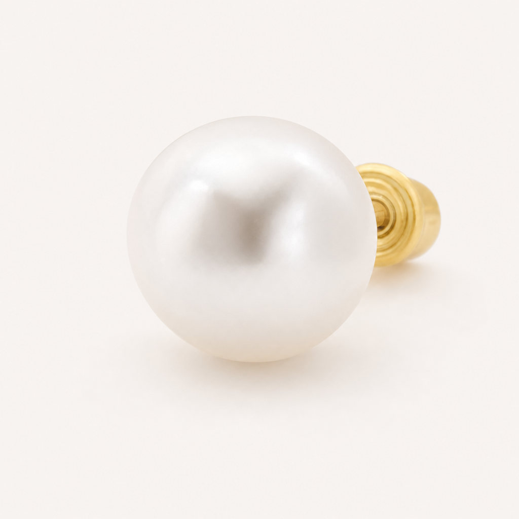 Broquel Perla 6 mm Oro 10K — macro frontal