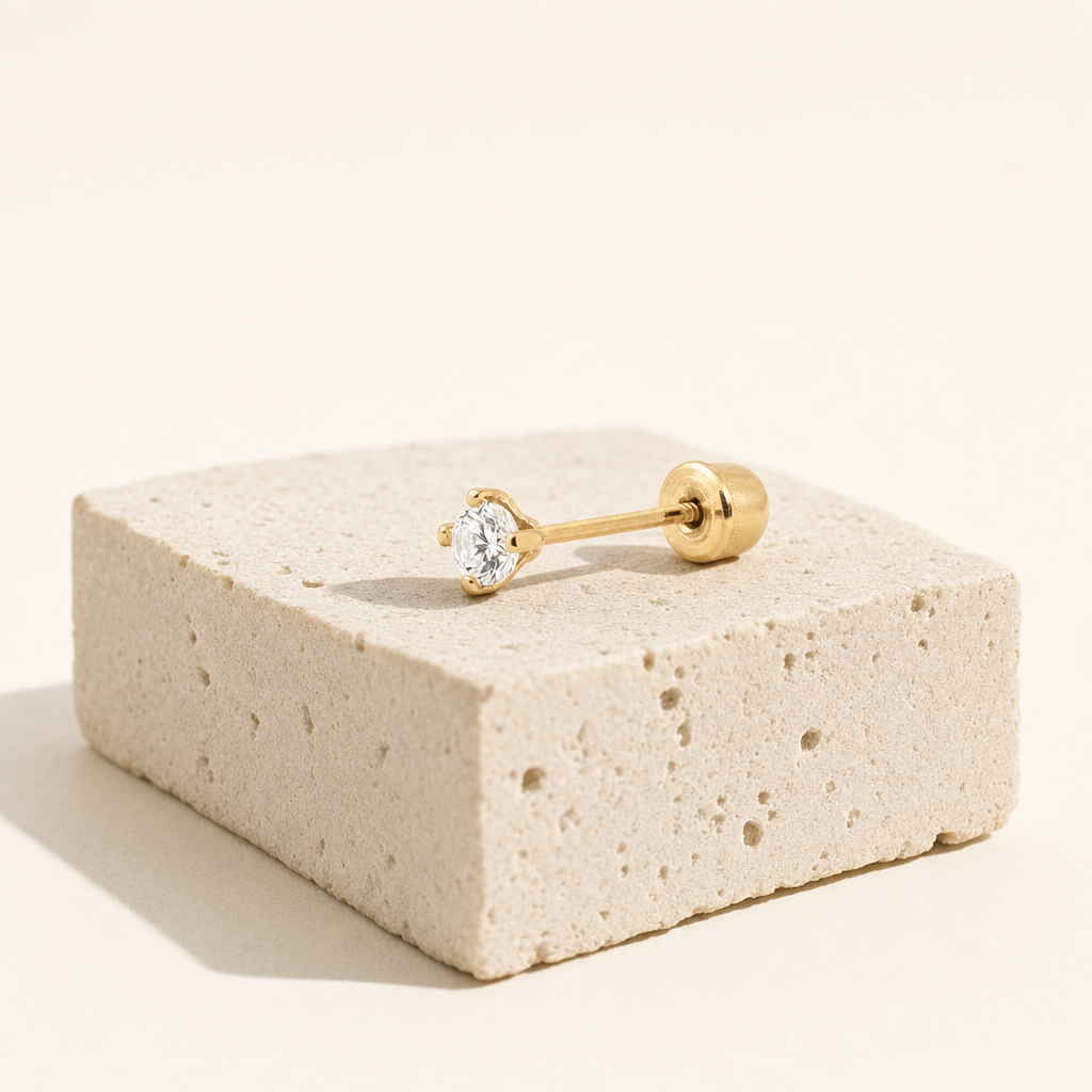 Broquel Solitario Zirconia Blanca 2.25 mm Oro 10K — bodegón editorial