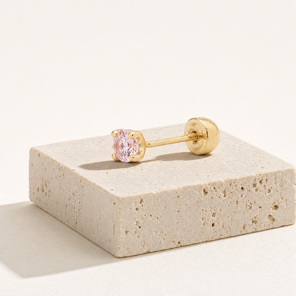 Broquel Solitario Zirconia Rosa 2.25 mm Oro 10K — bodegón editorial