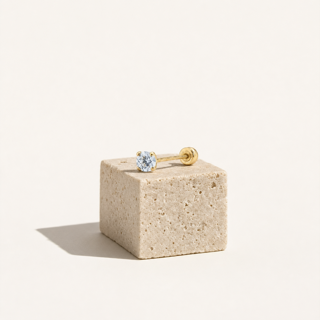 Broquel Solitario Zirconia Aqua 3 mm Oro 10K — bodegón editorial