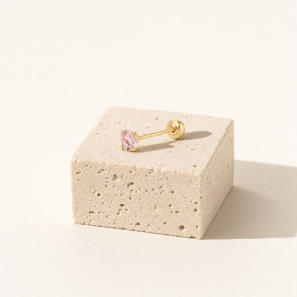 Broquel Solitario Zirconia Rosa 4 mm Oro 10K — bodegón editorial