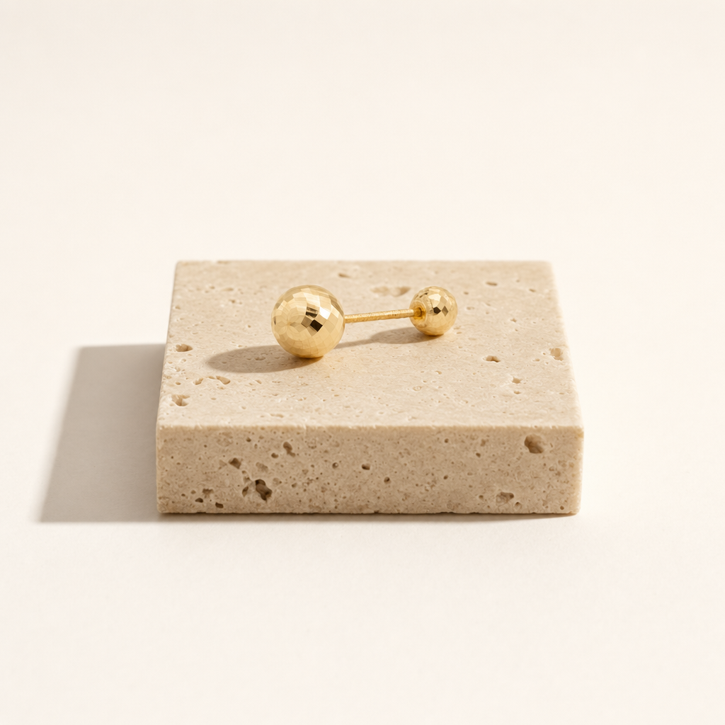 Broquel Dormilona 3.2 mm Oro 10K — bodegón editorial