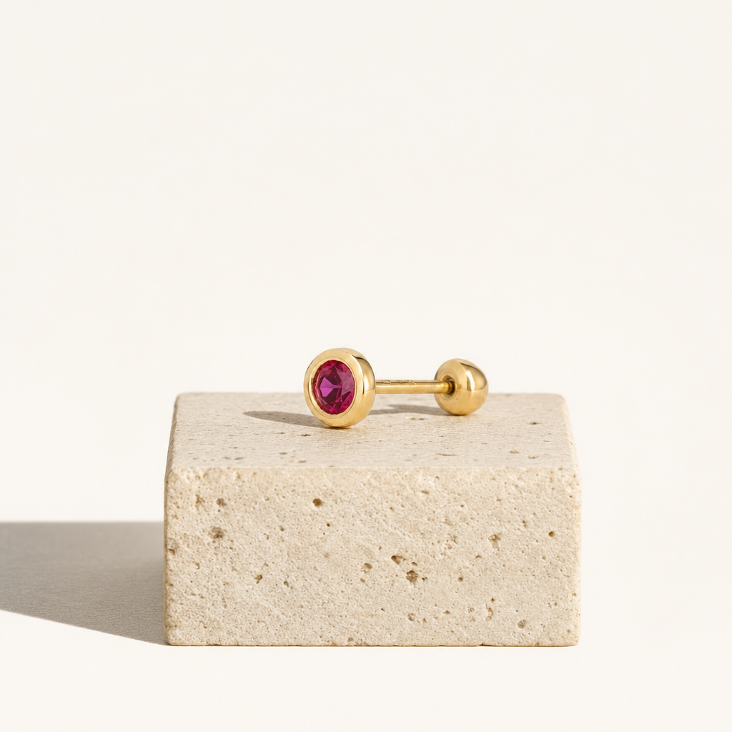 Broquel Bisel Zirconia Rubí 3 mm Oro 10K — bodegón editorial