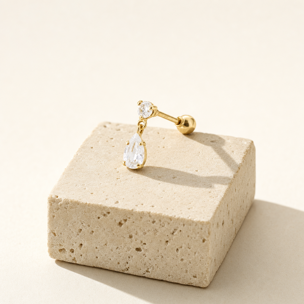 Broquel Colgante Gota Zirconia Blanca Oro 10K — bodegón editorial