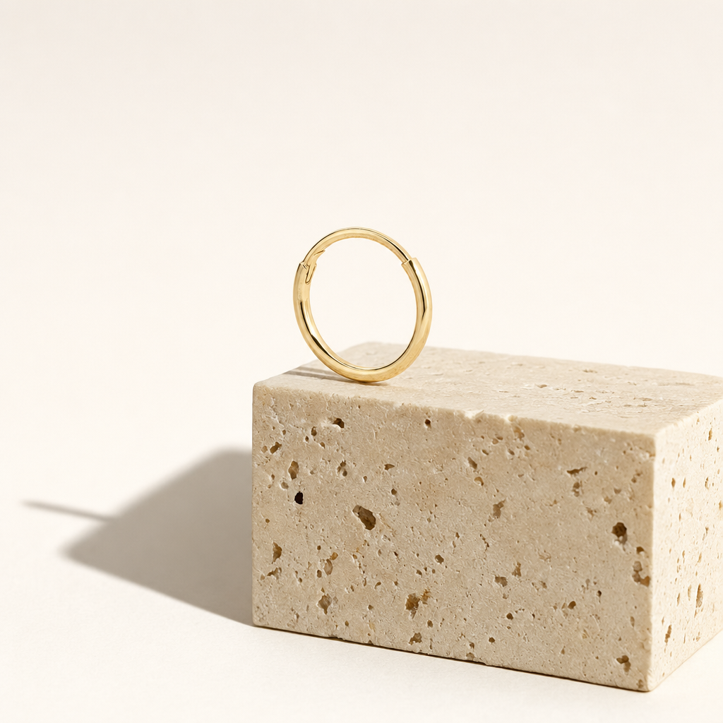 Arracada Lisa 6.6 mm Oro 10K — bodegón editorial