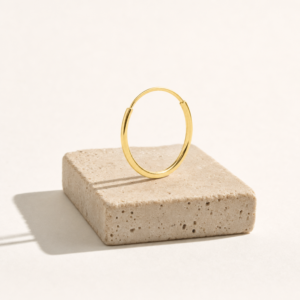 Arracada Lisa 9 mm Oro 10K — bodegón editorial