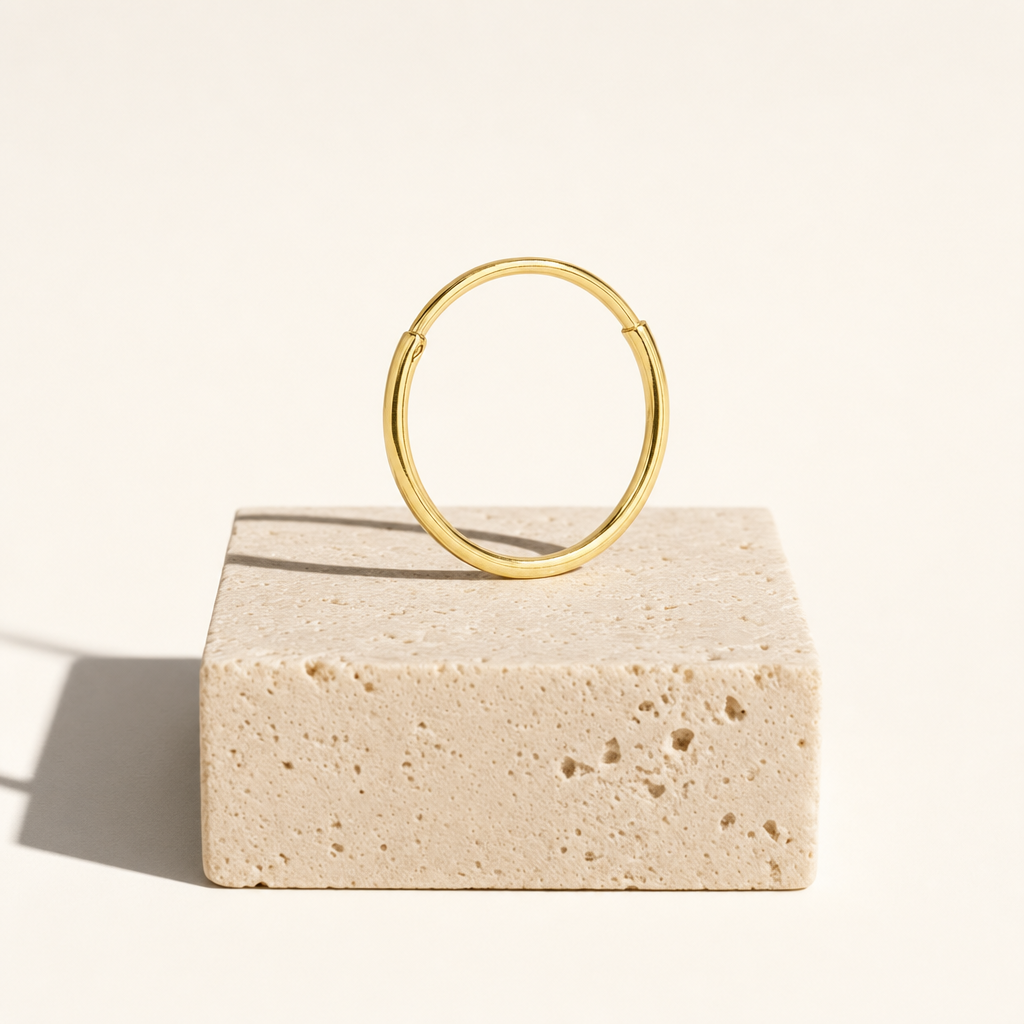 Arracada Lisa 12 mm Oro 10K — bodegón editorial