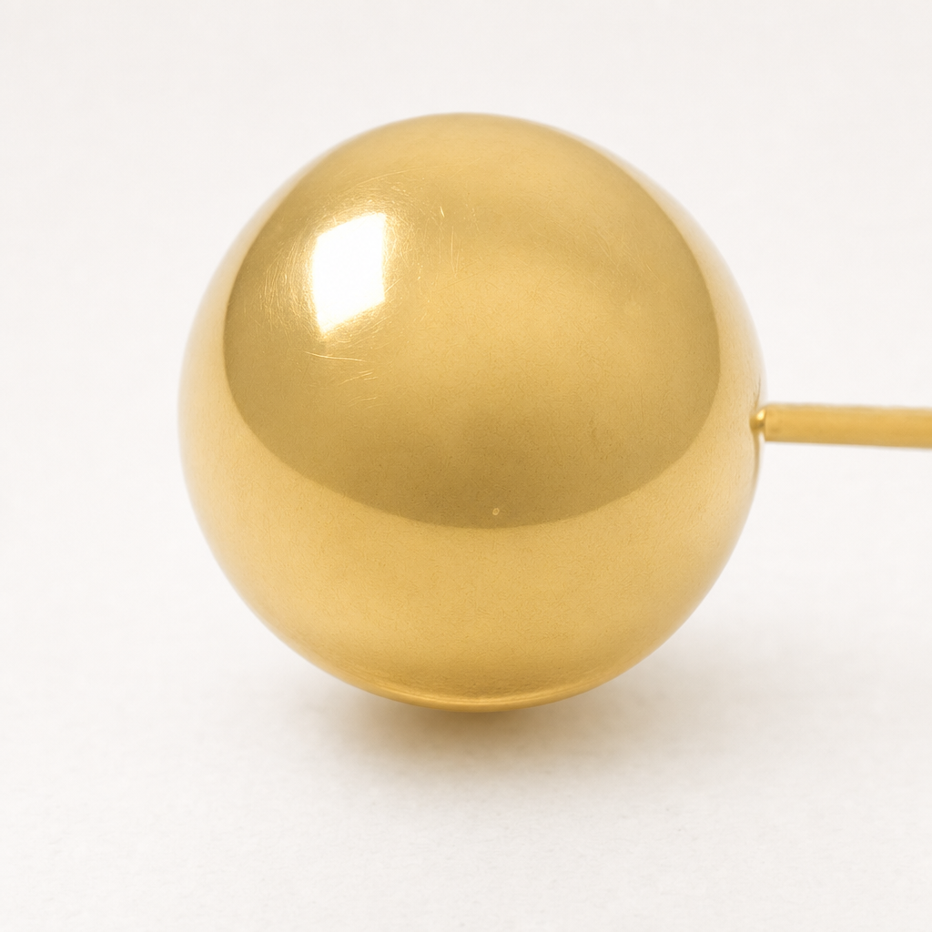 Broquel Dormilona 6 mm Oro 10K — macro frontal