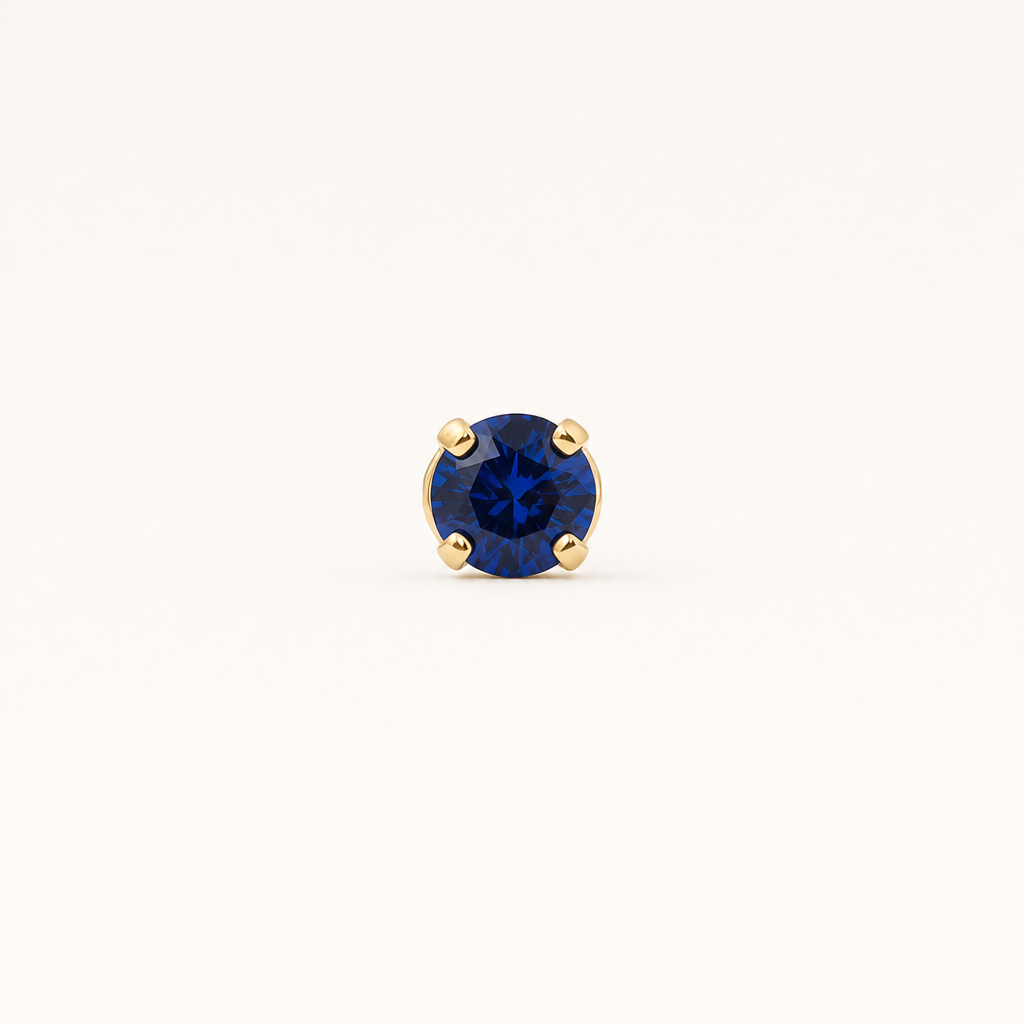 Broquel Solitario Zirconia Azul 4 mm Oro 10K — vista frontal