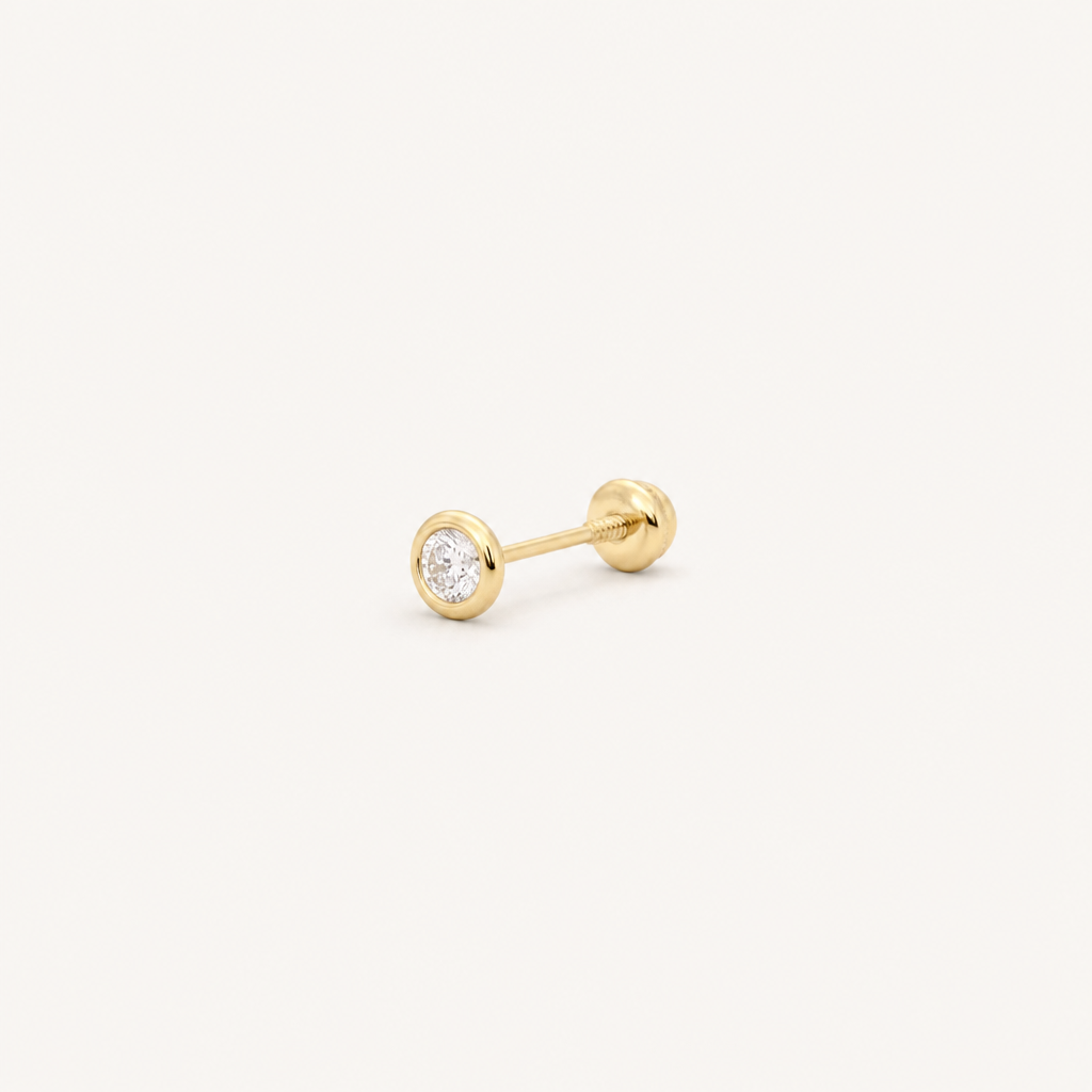 Broquel Bisel Zirconia Blanca 2.5 mm Oro 10K — vista diagonal