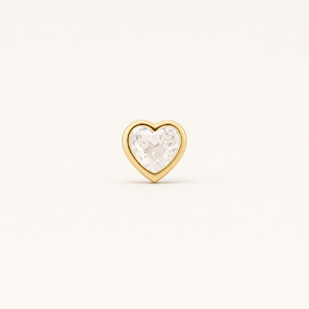 Broquel Bisel Corazón Zirconia 4 mm Oro 10K — vista frontal