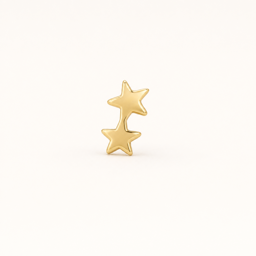 Broquel Estrella Doble Oro 10K — vista frontal