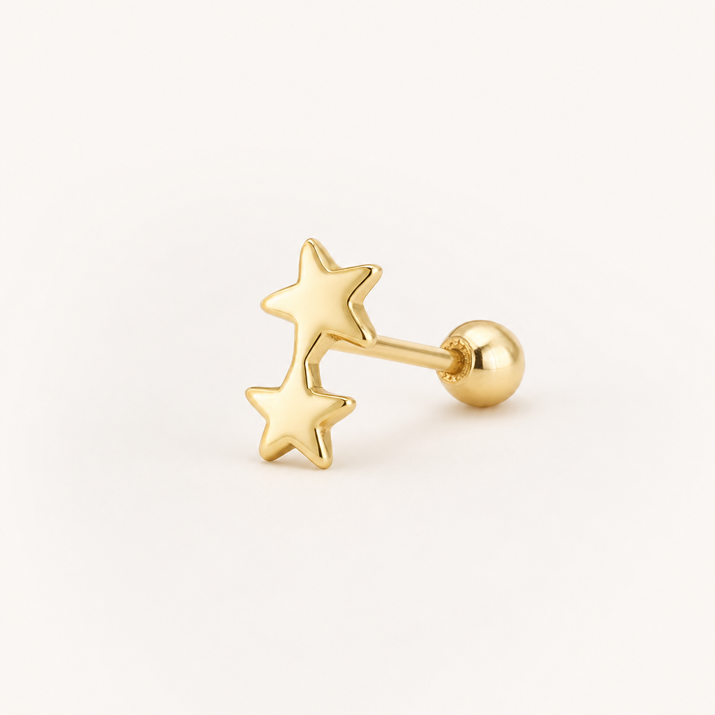 Broquel Estrella Doble Oro 10K — vista diagonal