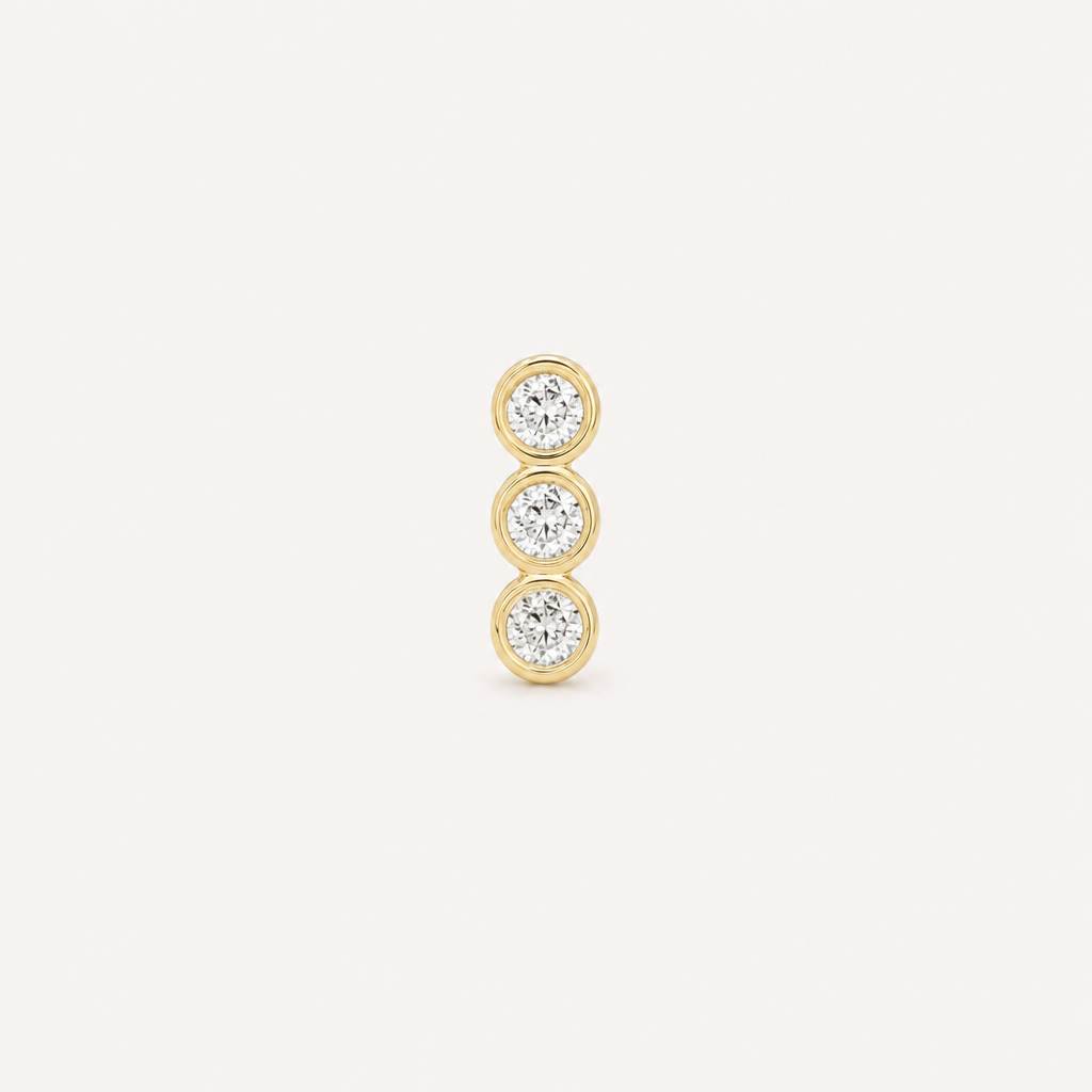 Broquel Tres Biseles Zirconia Oro 10K — vista frontal
