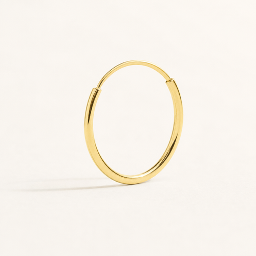 Arracada Lisa 9 mm Oro 10K — vista diagonal