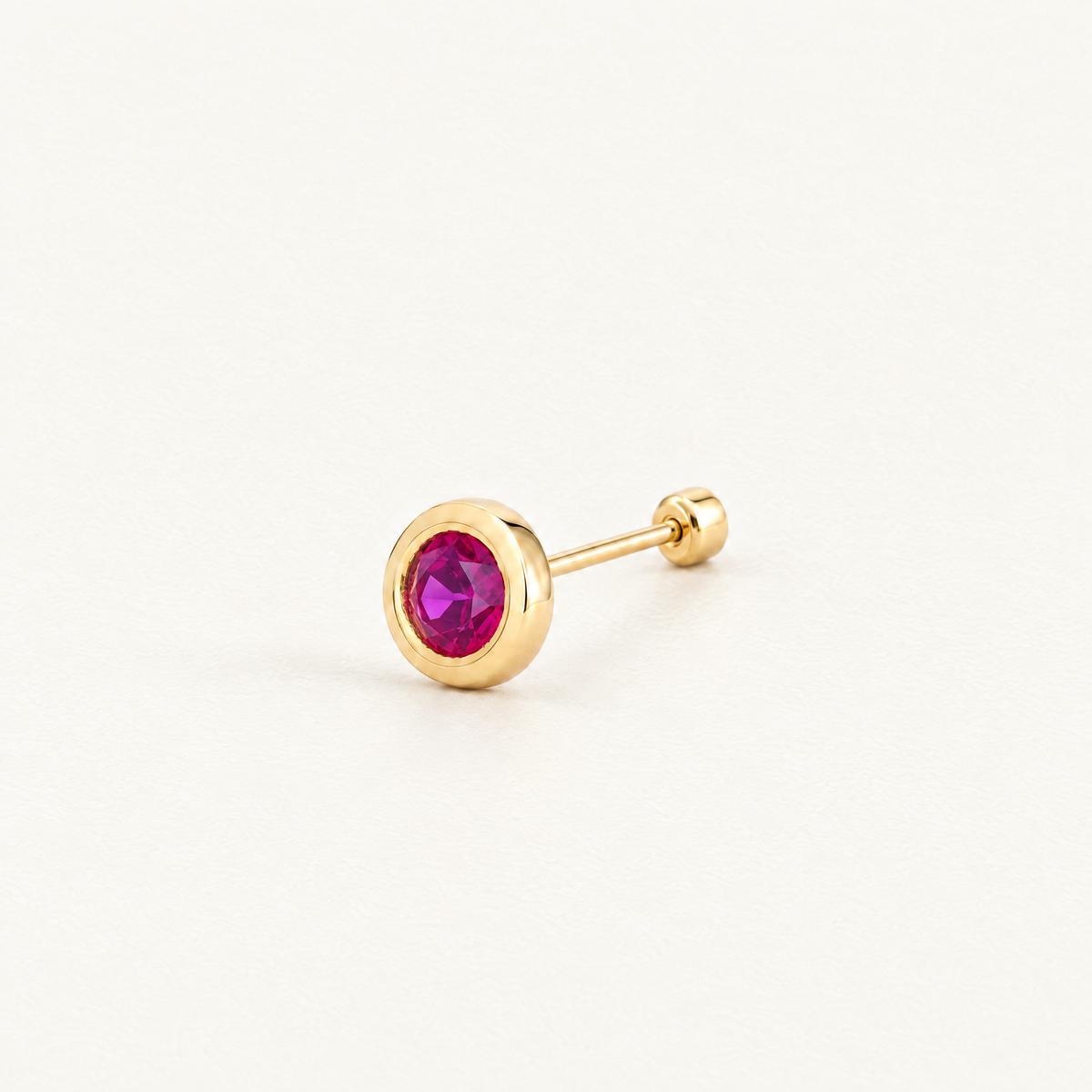 Broquel Bisel Zirconia Magenta 3 mm Oro 10K: vista principal.