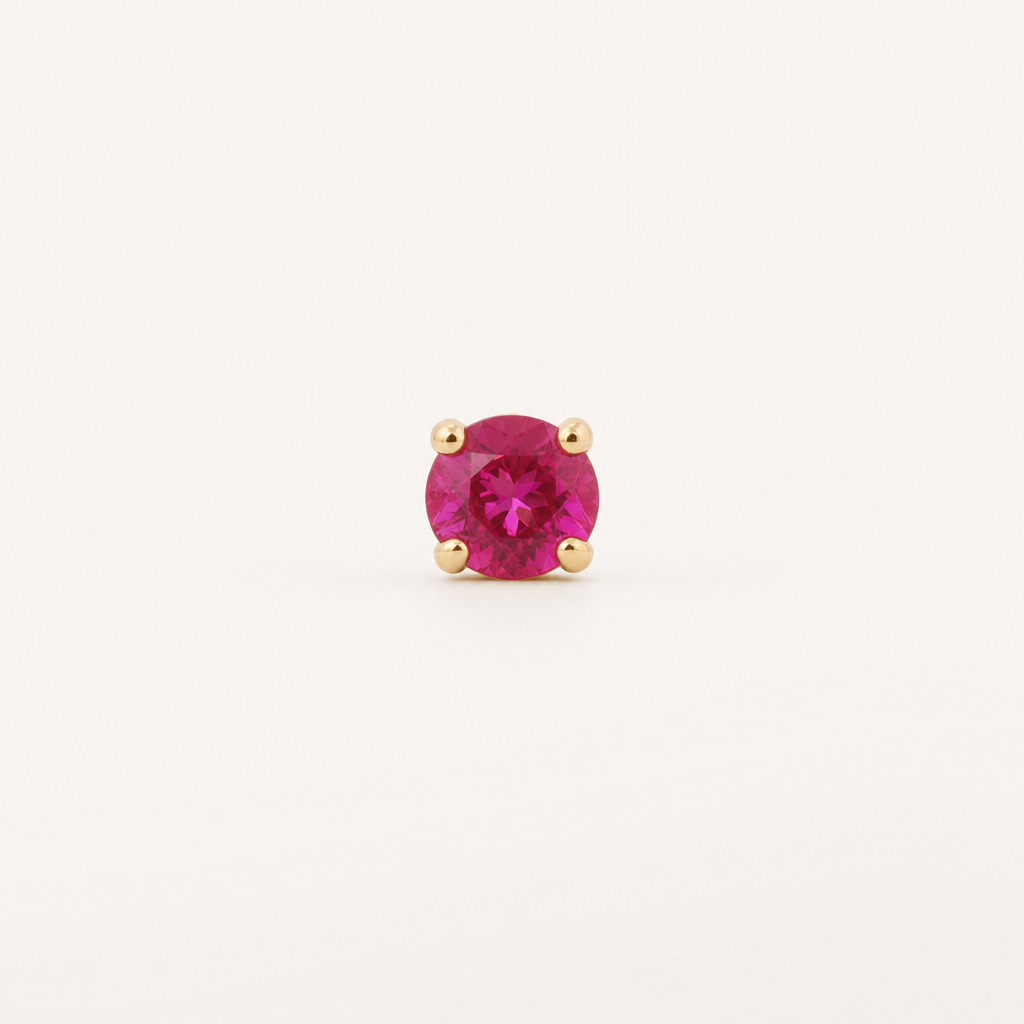 Broquel Solitario Zirconia Rubí 2.25 mm Oro 10K — vista frontal